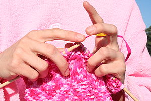 300px-Pink_knitting_in_front_of_pink_sweatshirt7.jpg